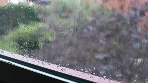 Rainy Window With Glass Drops Over Blurred Garden View Video stock 322097427