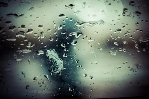 Rainy Window with Silhouette Stock Photos