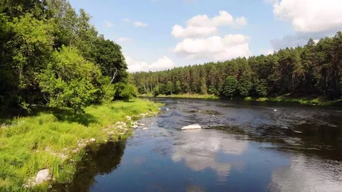 Raise above a river Vídeos de archivo 116831286