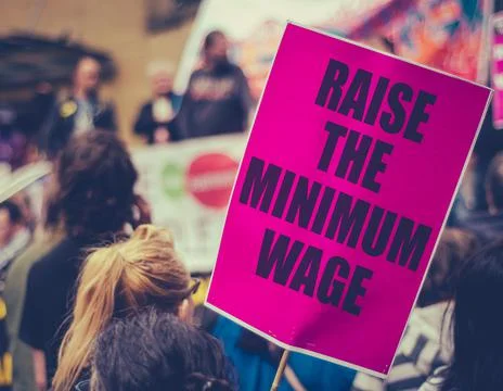 Raise The Minimum Wage Protest SIgn Stock-Fotos