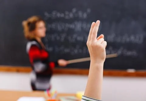 Raised arm in math class Stock Photos