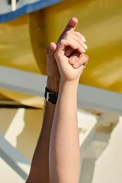 Raised hands symbolizing unity Stock Photos