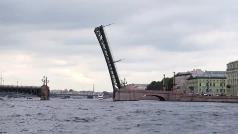Raised span of bascule Trinity bridge, panoramic side view from water. Video stock 226067035