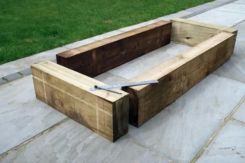 Raised vegetable, flower bed, made with Railway sleepers. Stock Photos