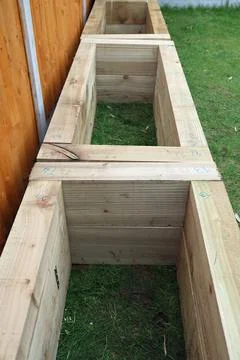Raised vegetable, flower bed, made with Railway sleepers. Stock Photos