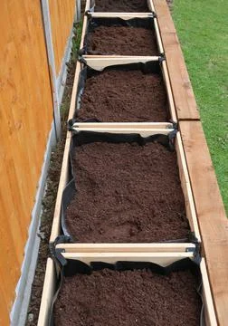 Raised vegetable, flower bed, made with Railway sleepers. Stock Photos