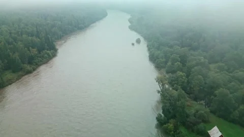 The raised water level in a mountain river. Danger of flooding Stock Footage 282153187