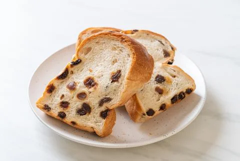 Raisin bread with coffee cup 스톡 사진