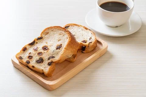 Raisin bread with coffee cup 스톡 사진