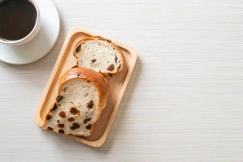 Raisin bread with coffee cup 스톡 사진