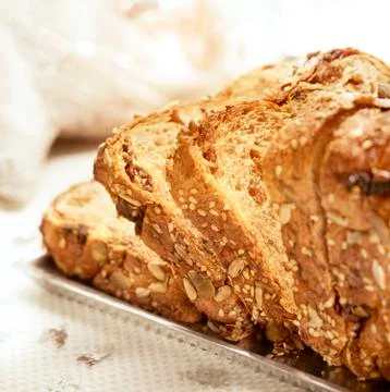 Raisin bread on a silver plate Stock Photos