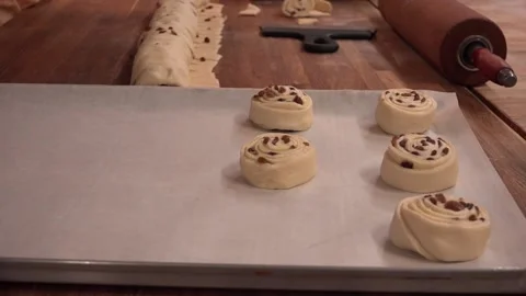 Raisin Bun and a rolling pin Stock Footage 239692546