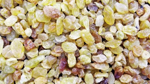 Raisin dried grape berries top view, rotation. Stock Footage 339304893