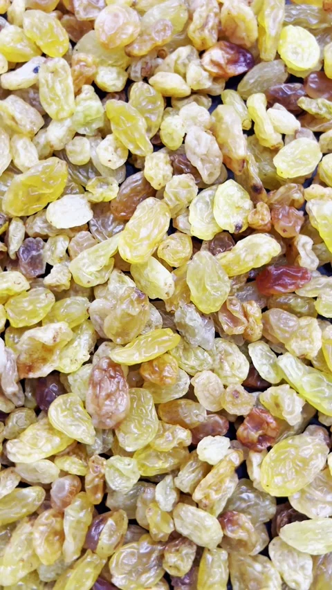 Raisin dried grape berries top view, rotation Stock Footage 339304894