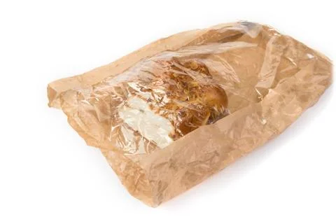 Raisin nuts bread pack in used brown paper bag Stock Photos