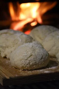 Raising dough by the fire Stock Photos