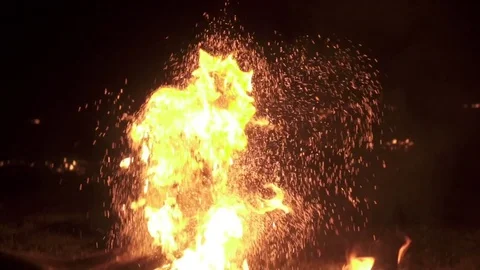 Raising fireball with embers dropping down - slow motion 動画素材 76800849