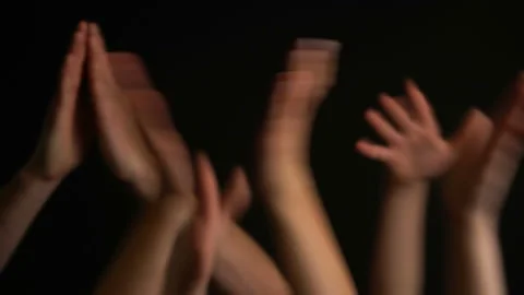 Raising hands with applause or clap on black background. Stock Footage 106737485