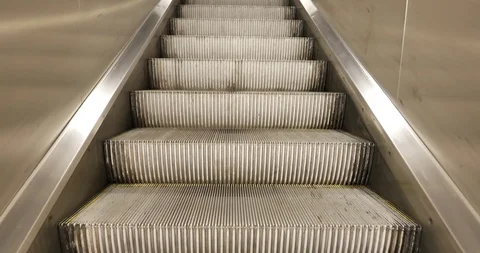 Raising up movement and close up view step tread of moving up escalator. Stock Footage 114996239