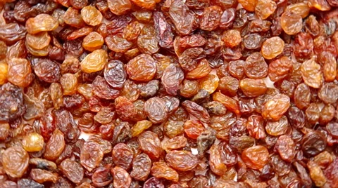 Raisins are spinning on a table. Stock Footage 35366076