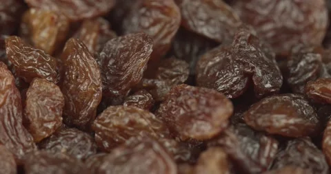 Raisins closeup rotating loopable Stock Footage 156843378