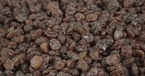 Raisins closeup rotating loopable Stock Footage 159702918