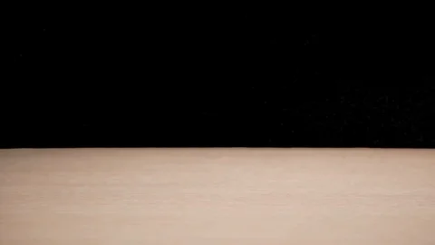 Raisins fall on the table Stock-Footage 126369411