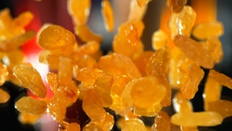 Raisins falling to the table water  in real 1080p slow motion 250fps, 4k Stock Footage 114968182