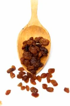 Raisins with a spoon Stock Photos