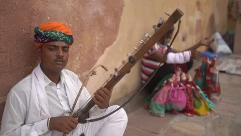 Rajasthani Musician and String Puppet Performer at Amer Fort, Jaipur, India Stock Footage 312947265