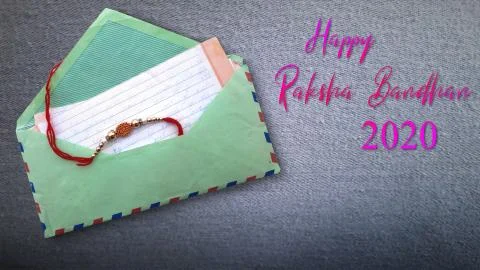 Rakhee or holy thread with message in envelope on Raksha Bandhan Stock Photos