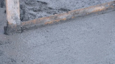 Raking concrete Stock Footage 102343737