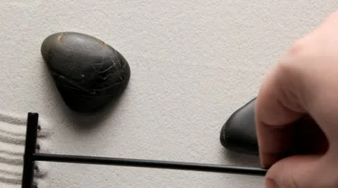 Raking sand Video stock 12749299