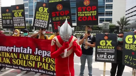 Rally calling for clean energy outside Japanese Embassy in Jakarta, INDONESIA, I Stock Footage 220322591