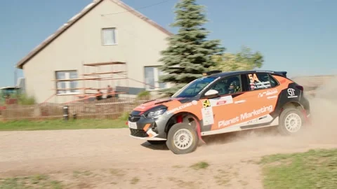 Rally car taking a sharp turn in slow motion 스톡 동영상 157374453