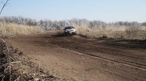 Rally competition, car driving on a very dusty track Stock Footage 50883353