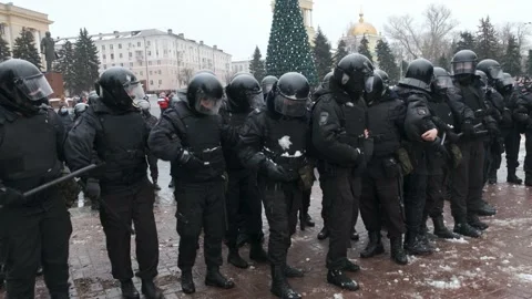 Rally in support of Navalny. Protesters throw snowballs at police officers Stock Footage 147586970