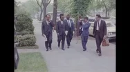 Ralph Abernathy Walks Near A Bus And Arrives At An Entrance With Civil Rights Stock Footage