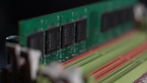 RAM Memory Stick in Socket of Computer Motherboard, Close Up Stock Footage 327540180