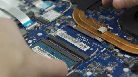 Ram memory sticks replacement damaged laptop repair disassembly process Stock Footage 231478750
