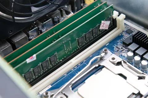 RAM Modules Near Processor and Fan on Motherboard Stock Photos