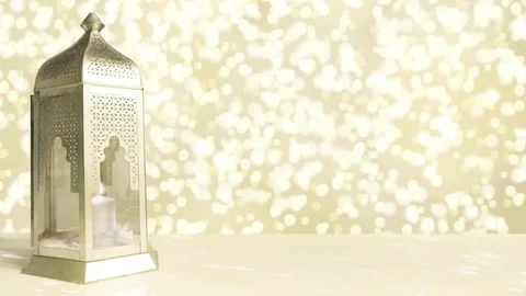 Ramadan arabic lantern, burning candle and glittering golden background. Video stock 73018042