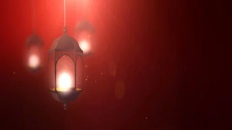 Ramadan candle lantern falling down hanging on string red background Stock Footage 96231467