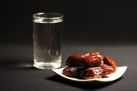 Ramadan is comming: water and dates Stock Photos