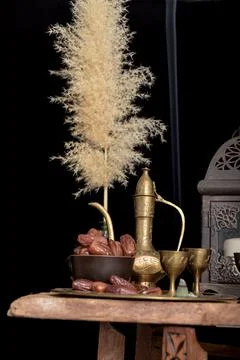 Ramadan concept. Dates closeup in the foreground. Ramadan Lantern on a wooden Stock Photos