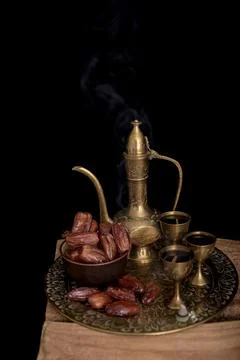 Ramadan concept. Dates closeup in the foreground. Ramadan Lantern on a wooden Stock Photos