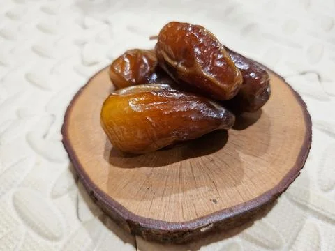 Ramadan fasting concept, close up dates of Eid mubarak with wooden backgrou.. Stock Photos