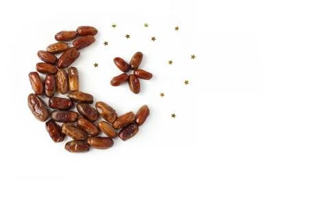 Ramadan, iftar desktop composition. Dried date fruit arranged in moon and star Illustrazione stock