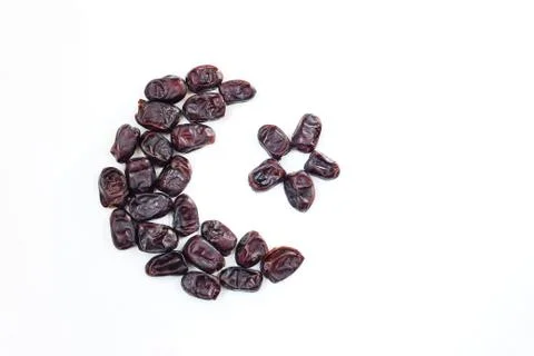 Ramadan, iftar table composition. Dried date fruit arranged in moon and star 스톡 사진