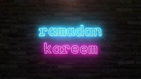 Ramadan kareem with neon text effect in wall background. Seamless looping vid Stock Footage 234098240